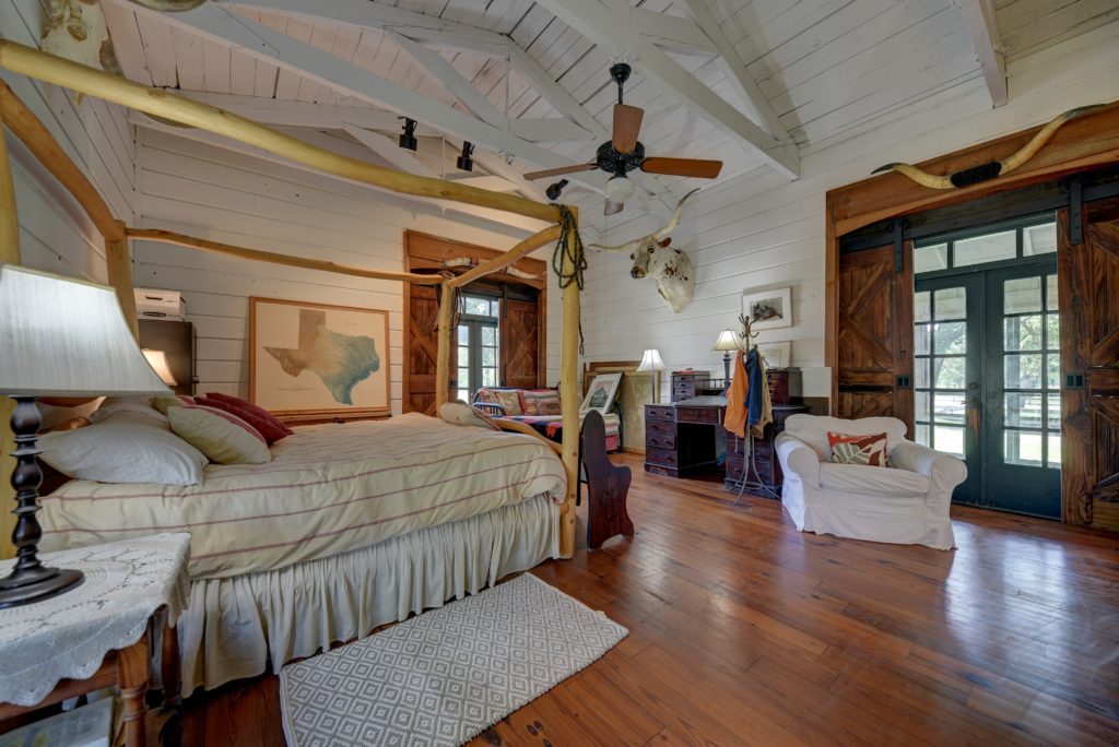 The master bedroom was fashioned from the freight car. (Photo by John Deans, Deans Imaging)