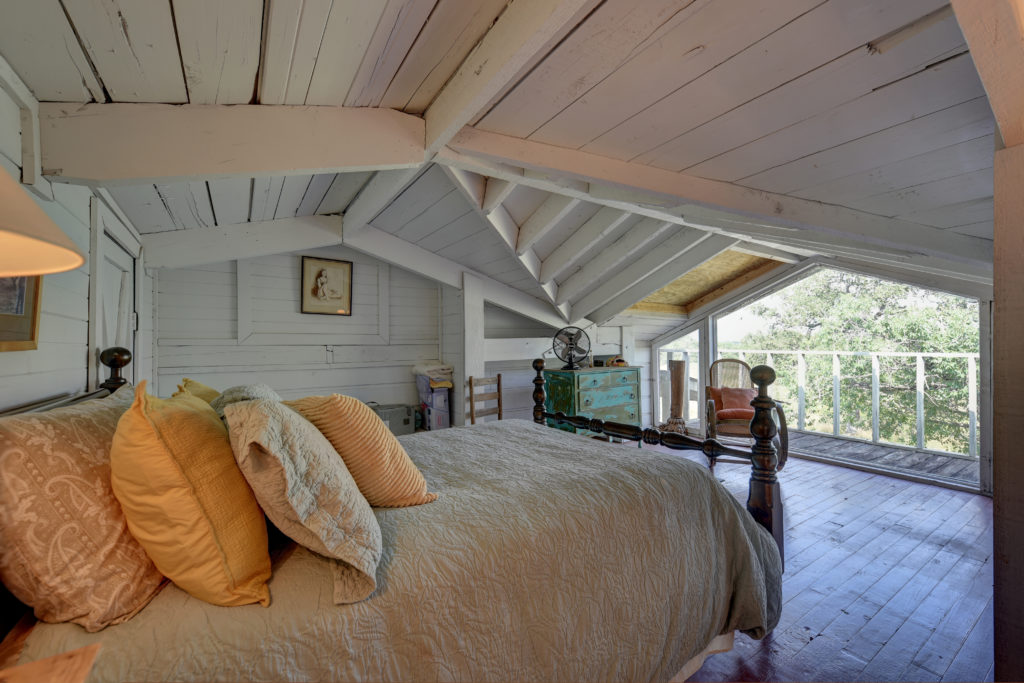 The second floor bedroom overlooks the lake and pastures. (Photo by John Deans, Deans Imaging)