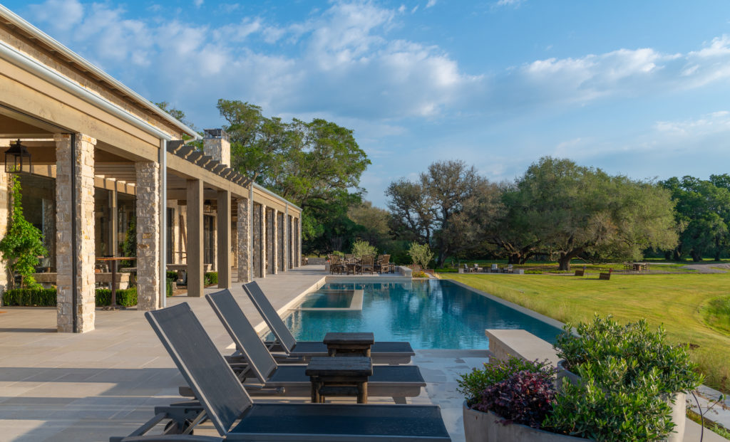 The infinity edge pool offers another form of recreation at Spread Oaks Ranch. (Photo by Michael Hunter)