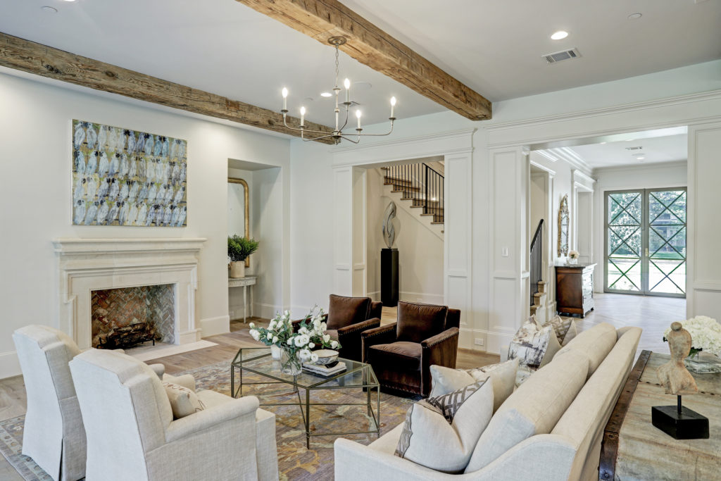 The living room in the John Daugherty, Realtors listing in Hunters Creek. (Photo by TK Images)