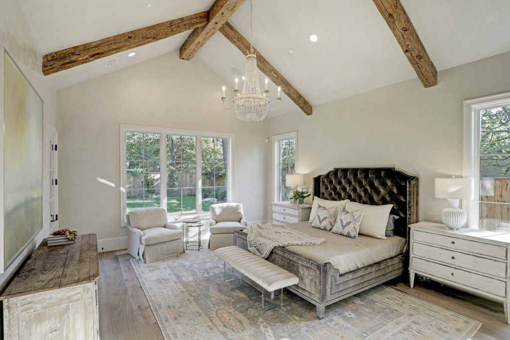 The master bedroom with cathedral ceiling at 10907 Walwick Drive. (Photo by TK Images)