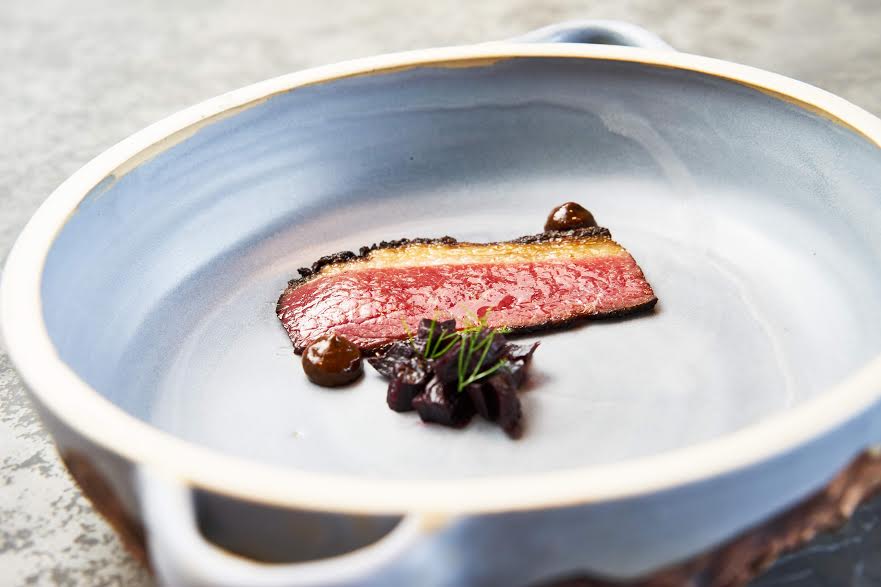 Rhodes' food is highlighted by homemade preserves, infused oils, and pickled vegetables, lending brightness to dishes. (Photo by Christopher Anderson/Solomon Sixteenth)