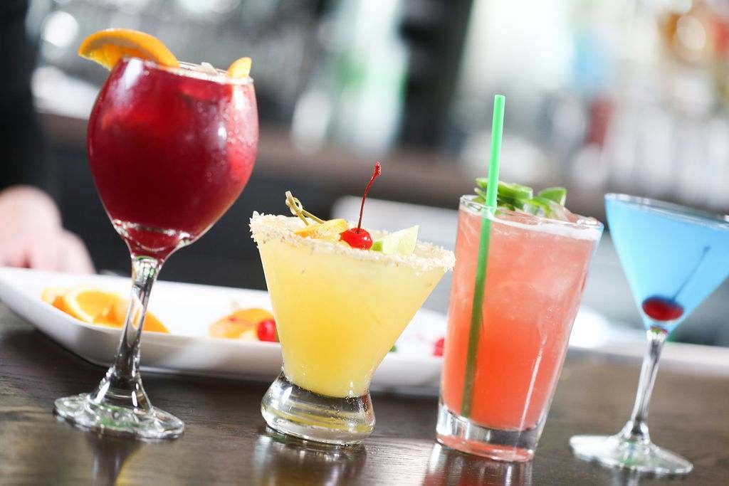 The burger joint includes a full-service bar with specialty cocktails. 