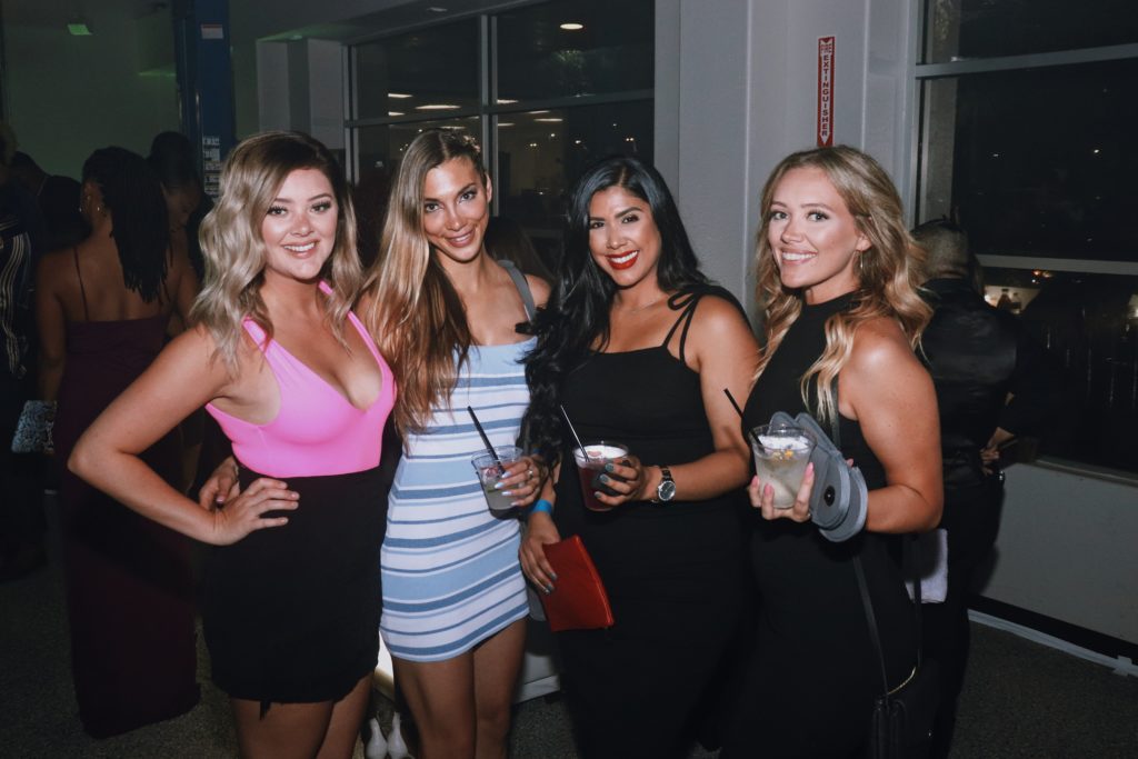 Party girl eye candy brightens the late-night/early-morning bash. (Photo by Sean Bennett)