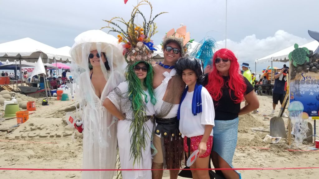 PGAL/Rogers O'Brien took honors for Best Costume coordinated with their 'Sea on the Rocks' sandcastle. (Photo by Rhonda Lowe)