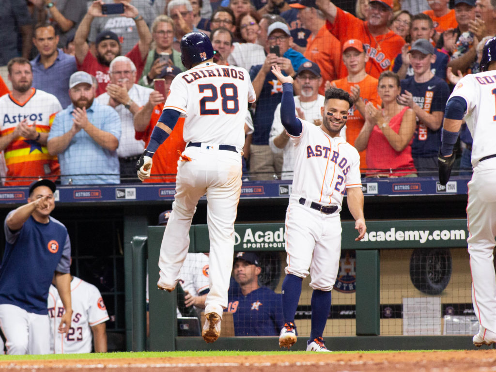 Jose Altuve and the Houston Astros know how to celebrate a big night. (Photo by F. Carter Smith)