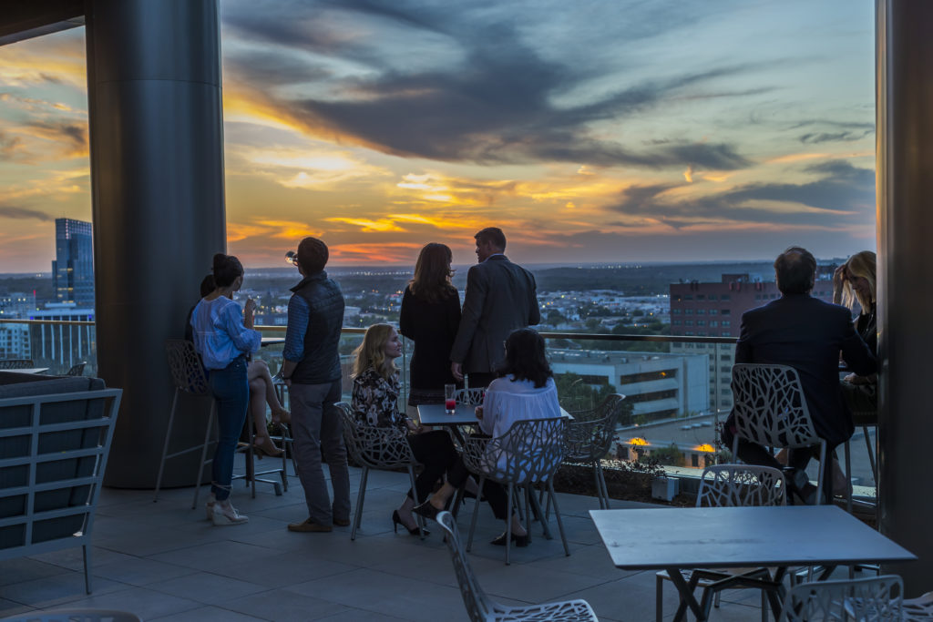 A perfect formula - a cocktail with a sunset view. (Photo by Jeremy Enlow)