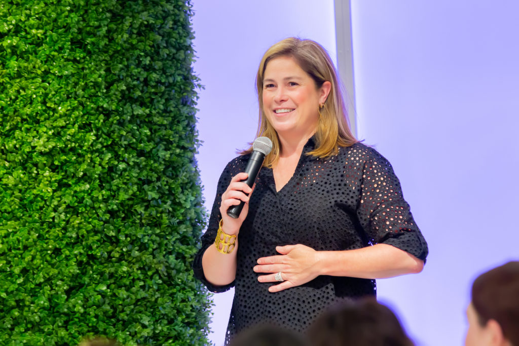 Kelsey Patterson getting the crowd ready. (Photo by Laura McCarthy/Elusive Images)