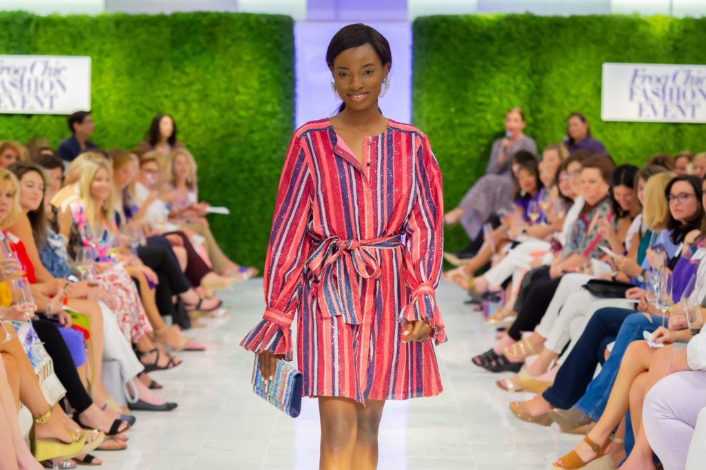 A great way to add purple to the color scheme via a Carolina Herrera striped shirt dress. (Photo by Laura McCarthy/Elusive Images)