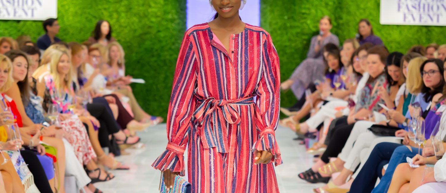 A great way to add purple to the color scheme via a Carolina Herrera striped shirt dress. (Photo by Laura McCarthy/Elusive Images)