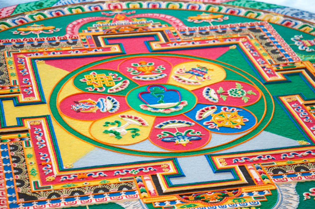 A close-up of a sand mandala. Try your hand at one this Saturday at Asia Society Texas Center.