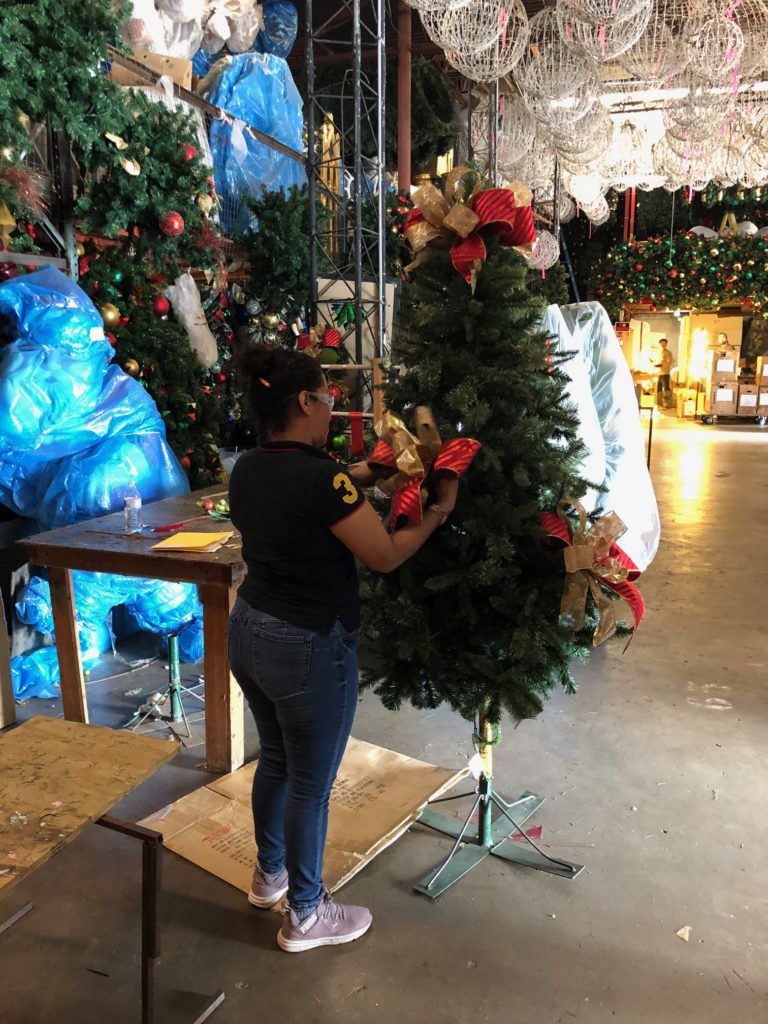 Always in Season artists work year-round creating thousands of Christmas trees for delivery across the Greater Houston area. (Photo by Shelby Hodge)