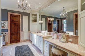 Architect Ed Eubanks designed the European style villa in Memorial where the master bath is more traditional.