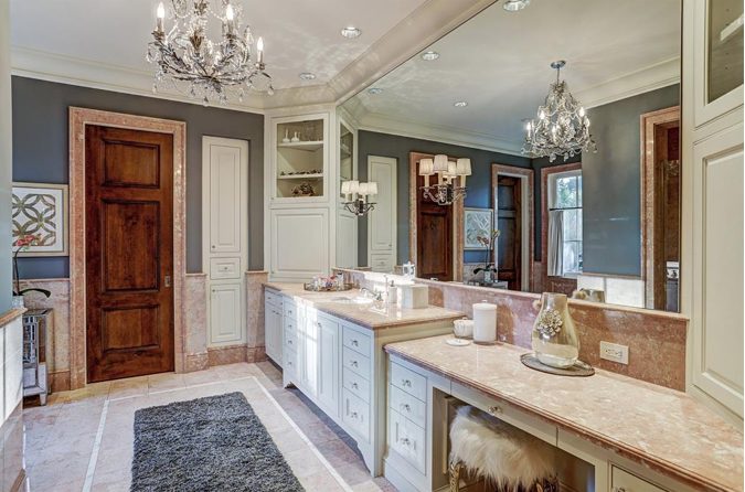 Architect Ed Eubanks designed the European style villa in Memorial where the master bath is more traditional.