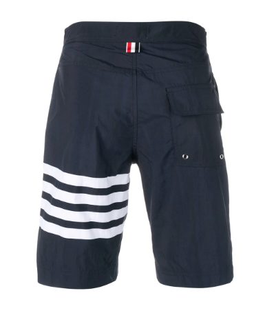Thom Brown 4-bar swim tech board short, available at farfetch.com, $490.