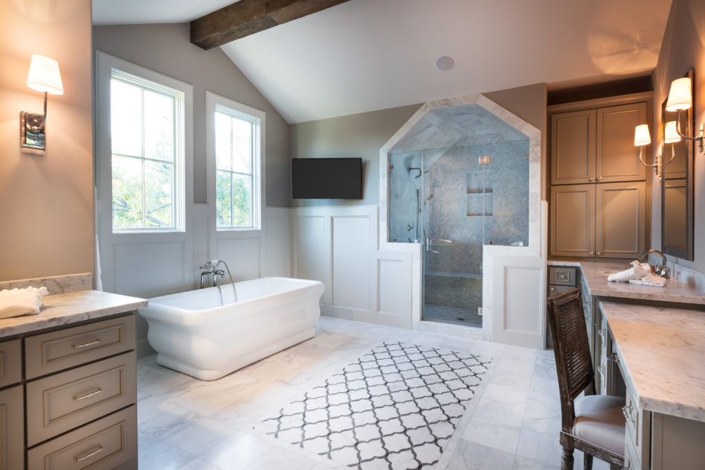 Architectural detailing but Frankel Building Group imbues this master bath in a home in the Braeburn neighborhood with a distinct personality suited to the owner's requirements.