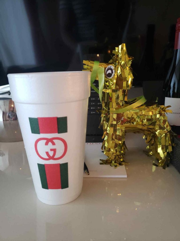 You know you are in for a great birthday party weekend when you receive oversized and customized raffia totes. And, there are customized plastic cups for your many poolside glasses of rose.