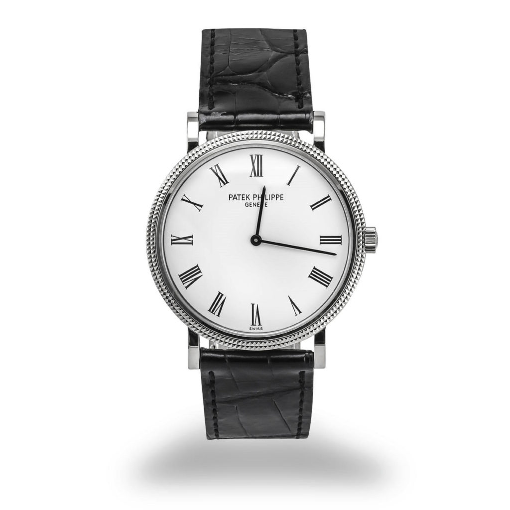 Patek Philippe Ultra Thin Calatrava 5120 White Gold boasting a black alligator strap with 18K white gold tang buckle.