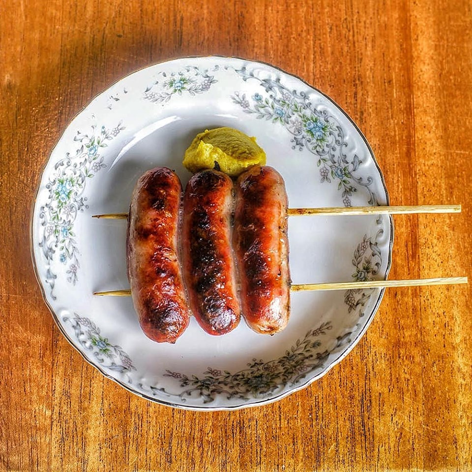 Arabiki sausage is served with a spicy mustard. Courtesy of Salaryman