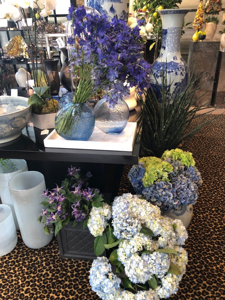 Delphiniums, hydrangeas and Japanese urns invite adoration.(Photo by Shelby Hodge)