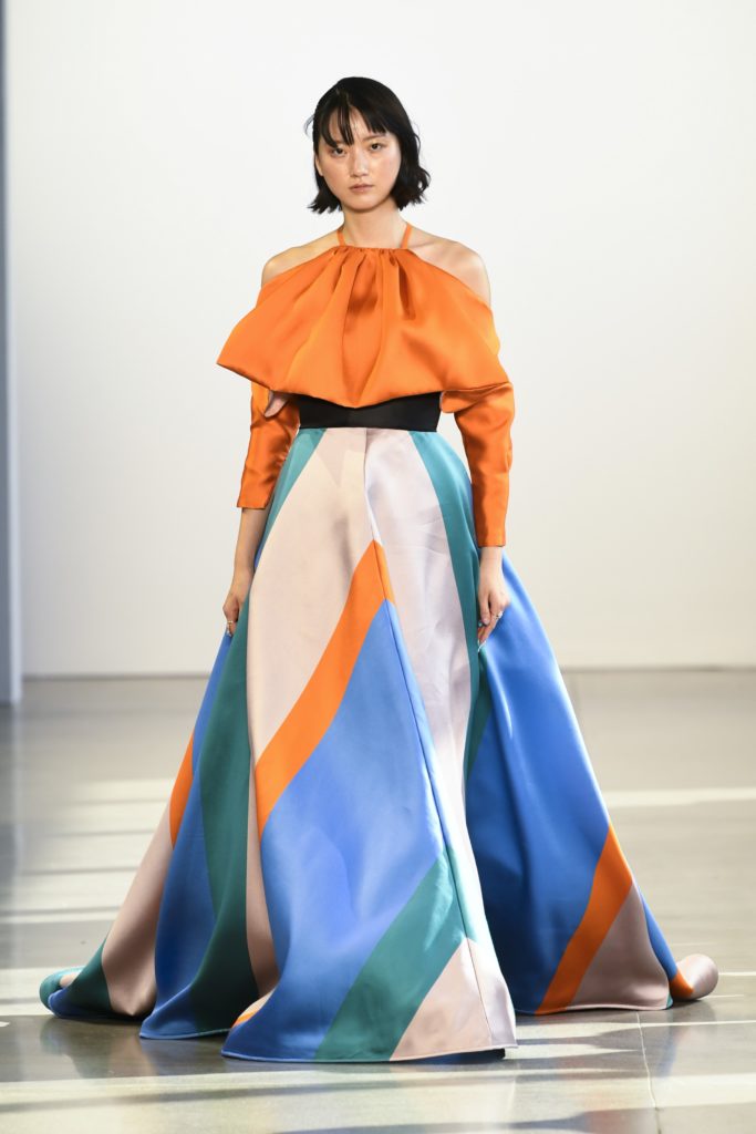 Bibhu Mohapatra multi-band silk barathea gown under tangerine draped sleeve jacket. (Photo courtesy of Bibhu Mohapatra)