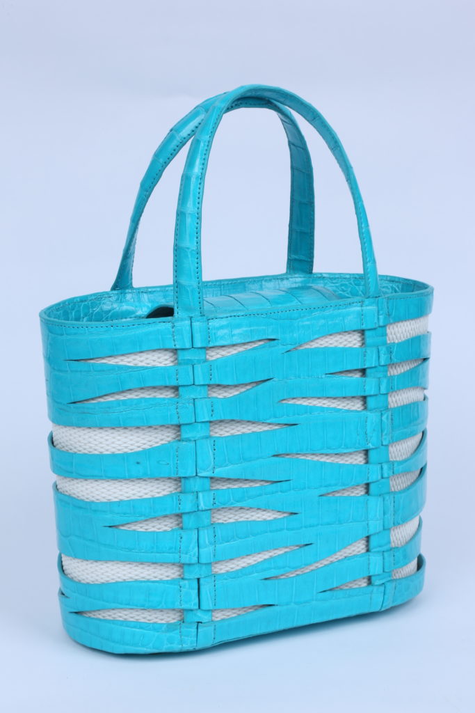Nancy Gonzalez small linen and crocodile zebra cut-out tote. (Photo courtesy of Nancy Gonzalez)