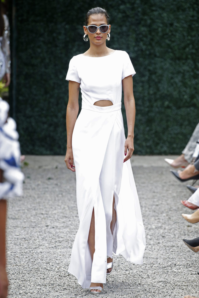 Burnett New York white jumpsuit with overskirt. (Photo courtesy of Burnett New York)