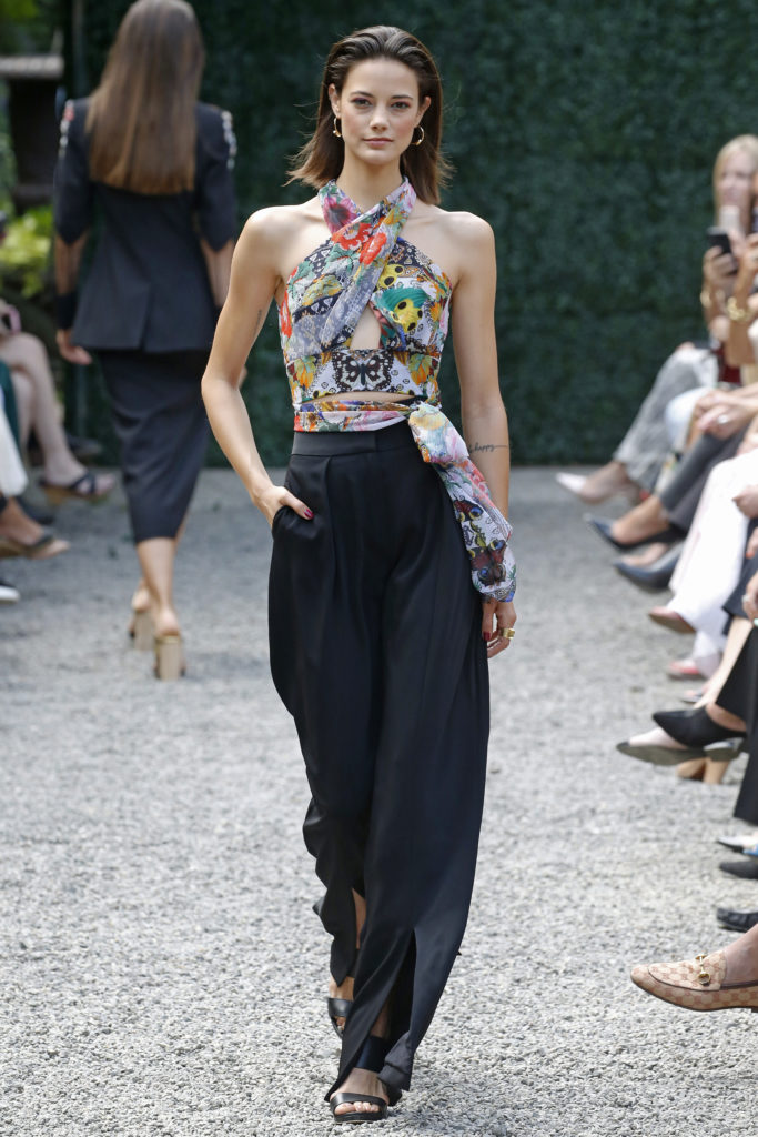 Burnett New York floral halter chiffon top with black high waisted pants. (Photo courtesy of Burnett New York)