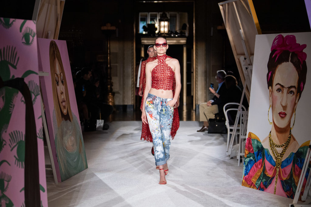 Christian Siriano said he was inspired by the colors and textures of Ashley Longshore's artwork in creating his spring 2020 runway collection. (Photo by Luca Zanoni)