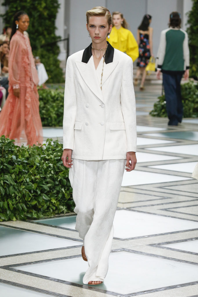 Tory Burch white double-breasted jacket with black detail and white trousers. (Photo courtesy of Tory Burch)