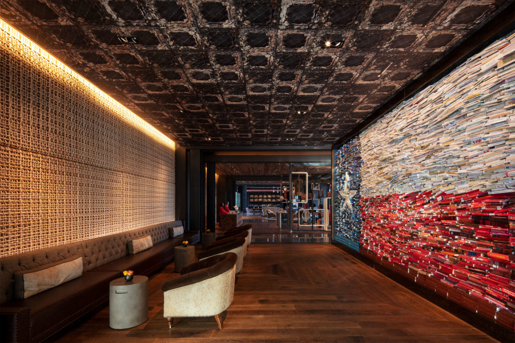 At The George hotel in College Station, MaRS created a Texas flag out of a wall of books. Photo credit Eric Laignel.