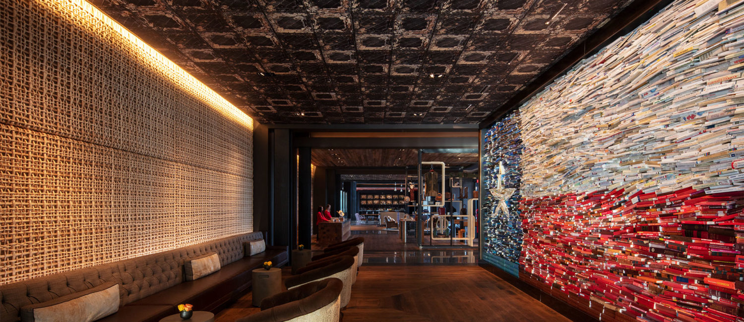 At The George hotel in College Station, MaRS created a Texas flag out of a wall of books. Photo credit Eric Laignel.