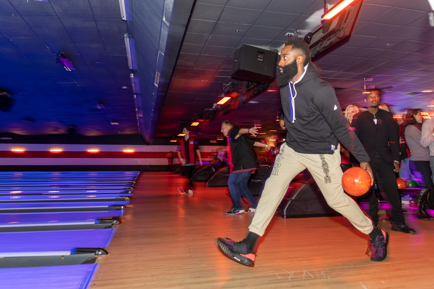 James Harden bowls with teammates and guests (Photo by Lee Beckman)
