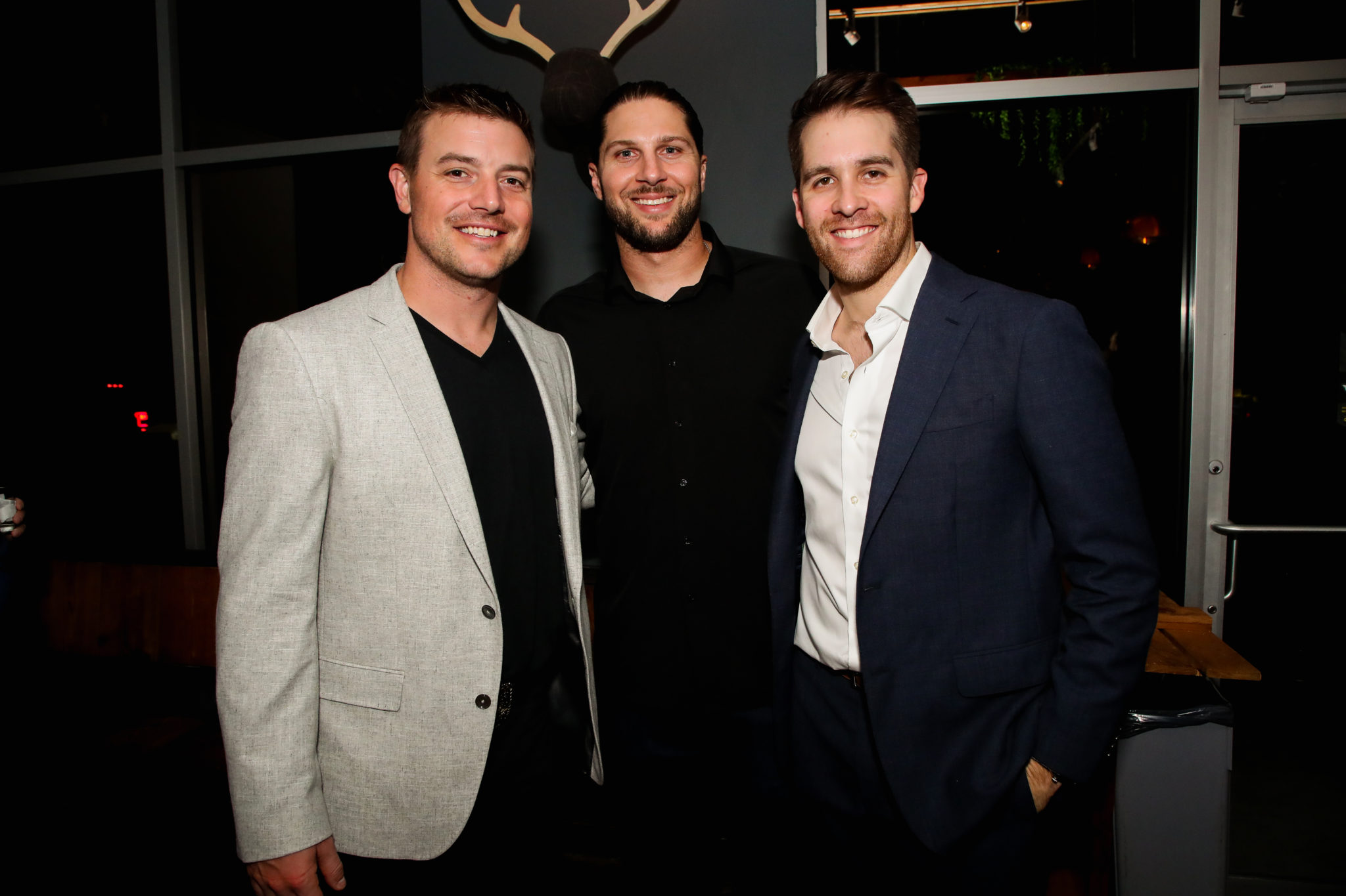 Joe Smith, Jake Marisnick and Collin McHugh (Photo by Alex Bierens de Haan )