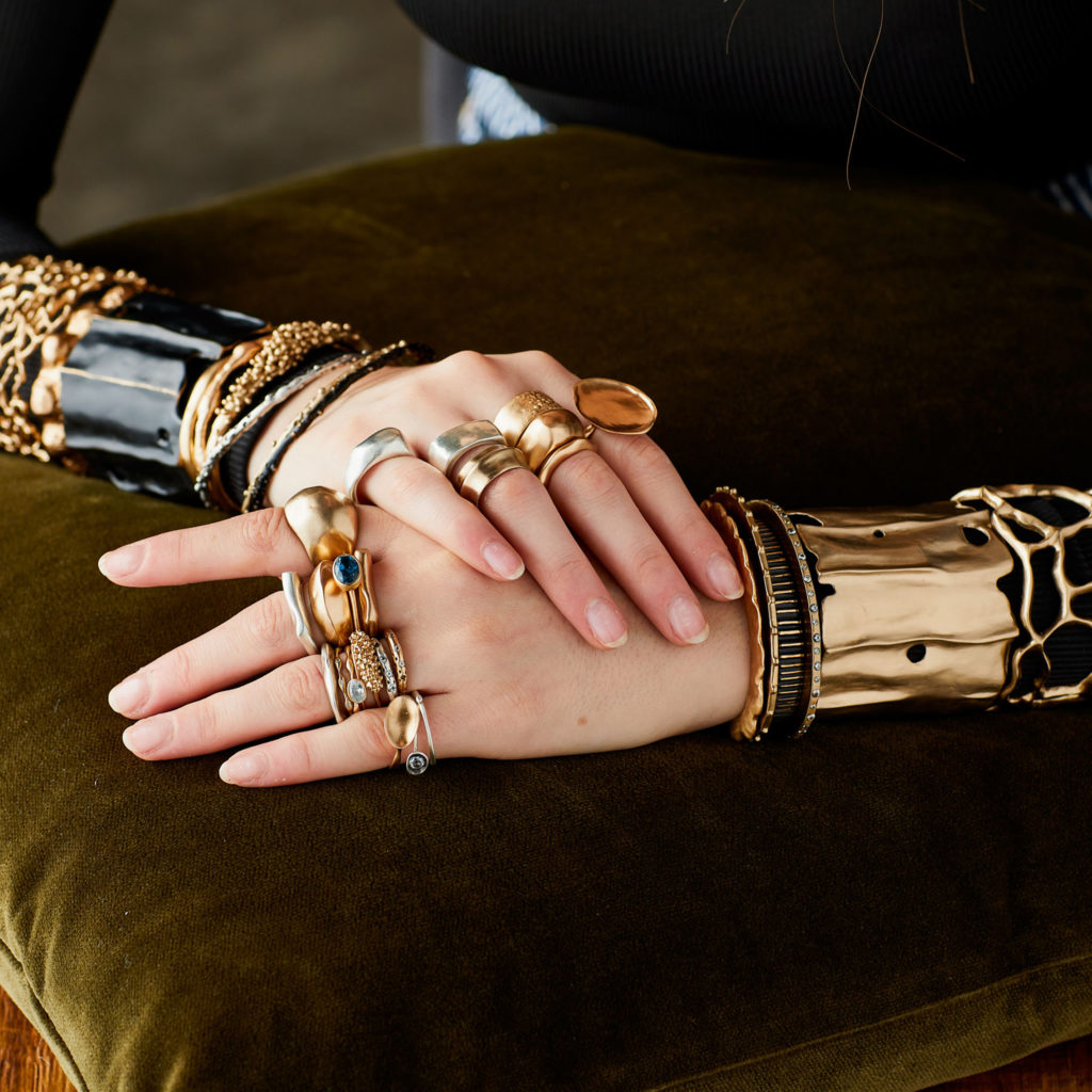 Rings and cuffs by Julie Cohn.