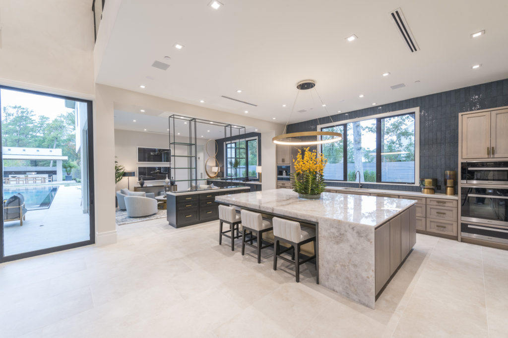 Interior design details from the kitchen to the TV room meet the luxury standards of the Al Ross design. (Photo by Jeff Myers Photography)