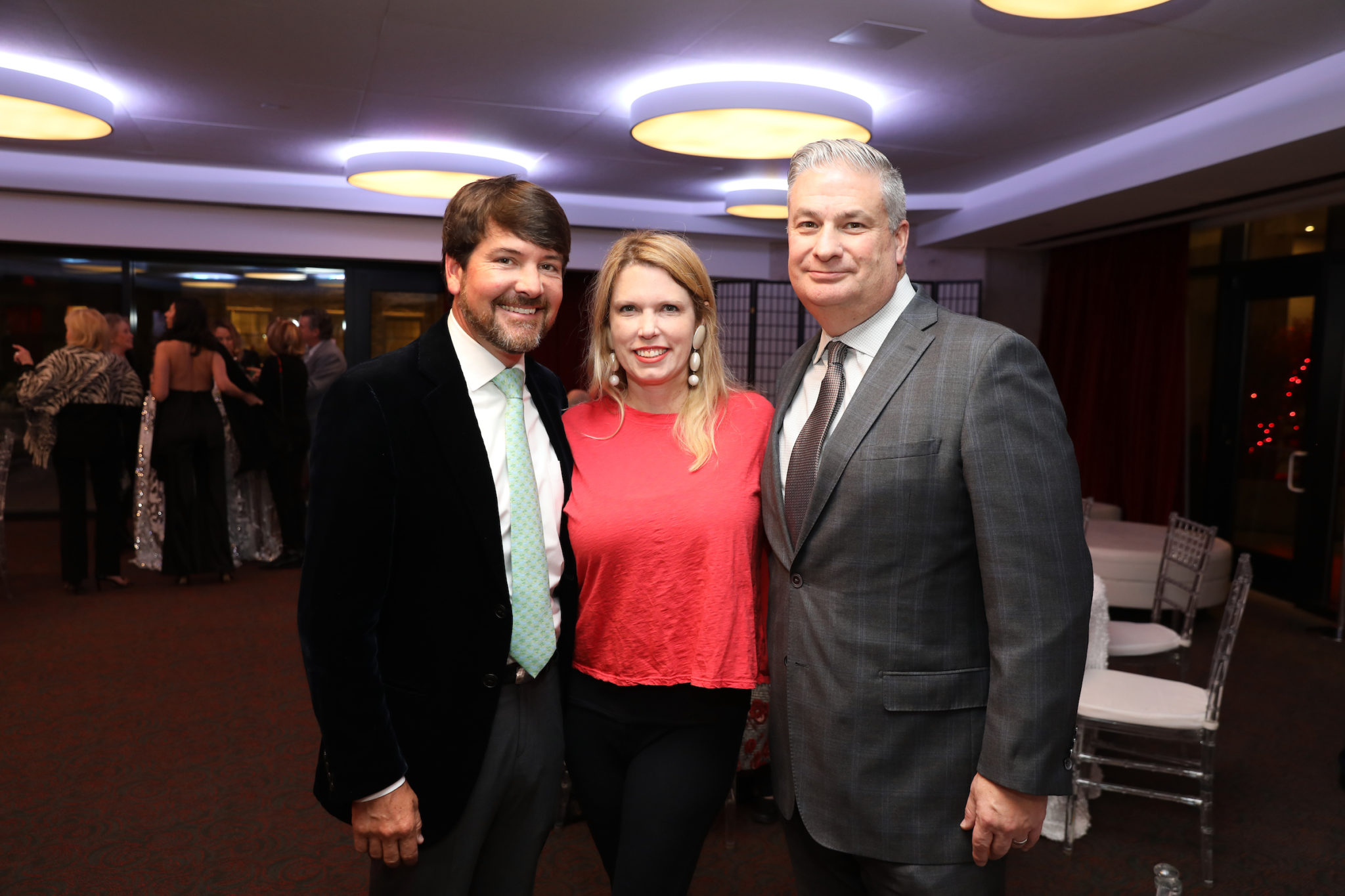 Alley Theatre 2019-20 Deck the Trees. Bill and Courtney Toomey with Butch Mach. Photo by Priscilla Dickson.