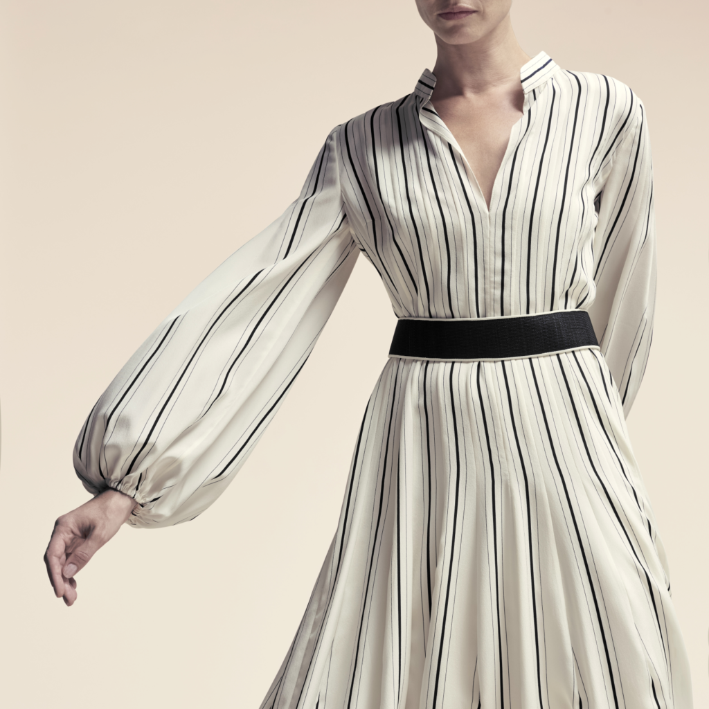 Embroidery detailing adds elevated craftsmanship to each piece.