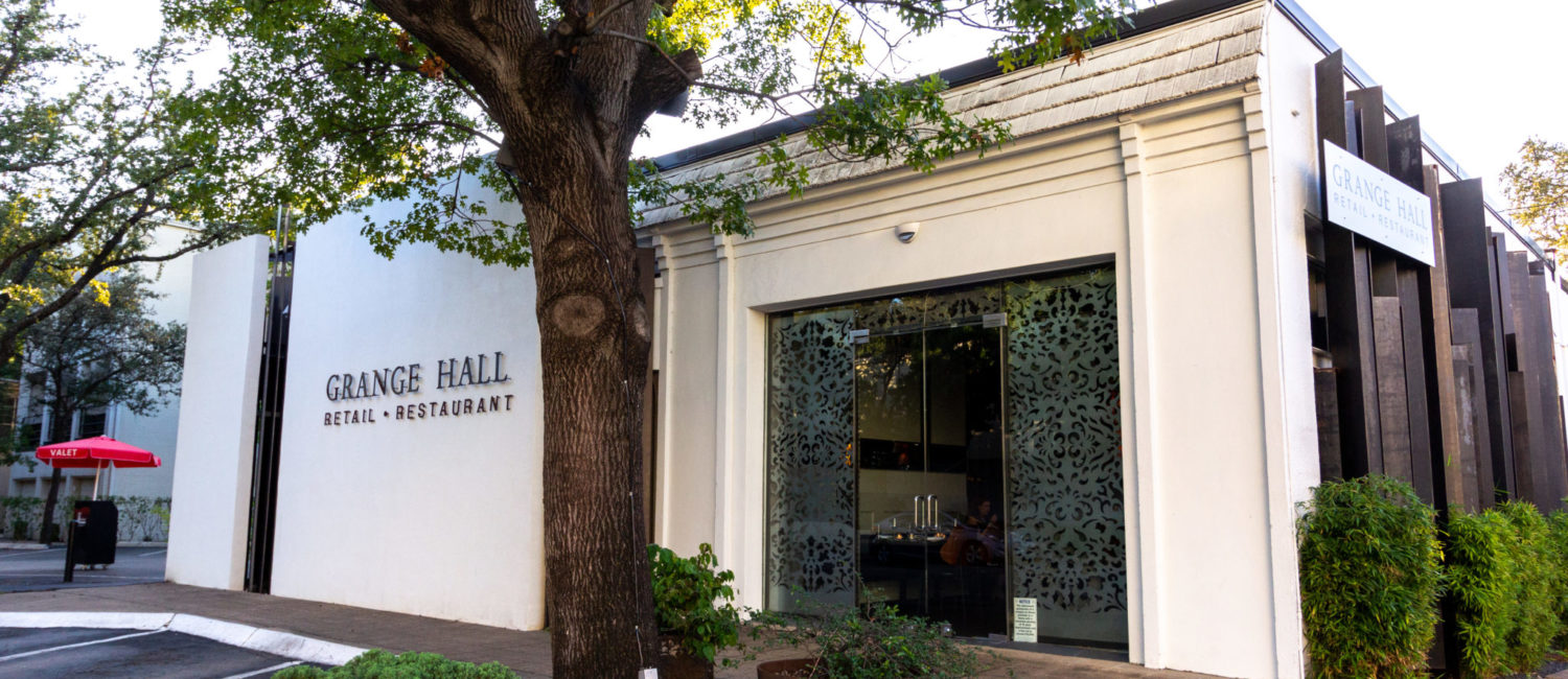 The white facade to Grange Hall which belies the dark and moody space found within.