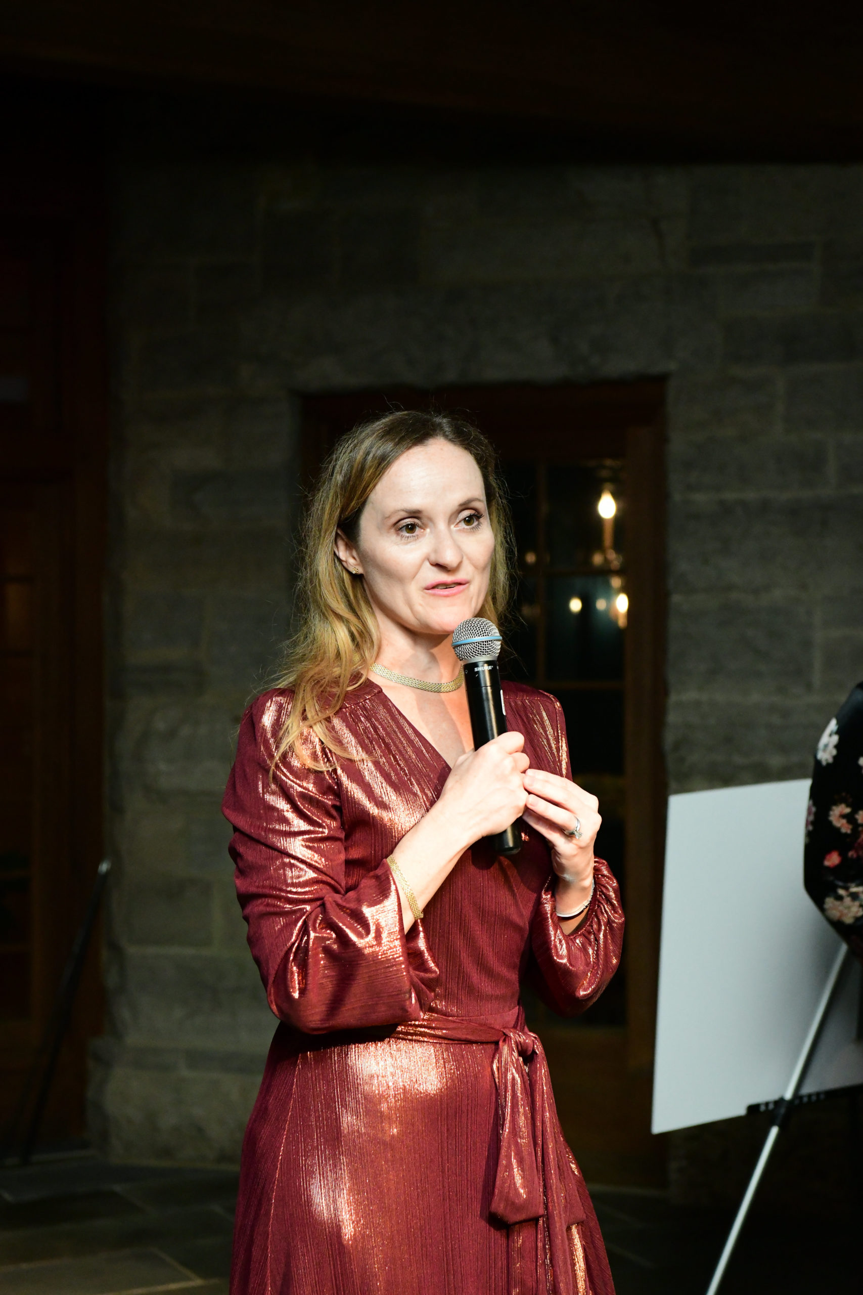 The Galleria's Lisa Bendfeldt reveals the raffle winners. (Photo by Daniel Ortiz)