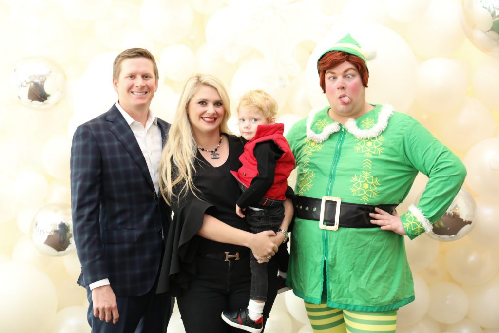 Bill Gutknecht & Christine Falgout with their son and Buddy The Elf (Photo by Priscilla Dickson)
