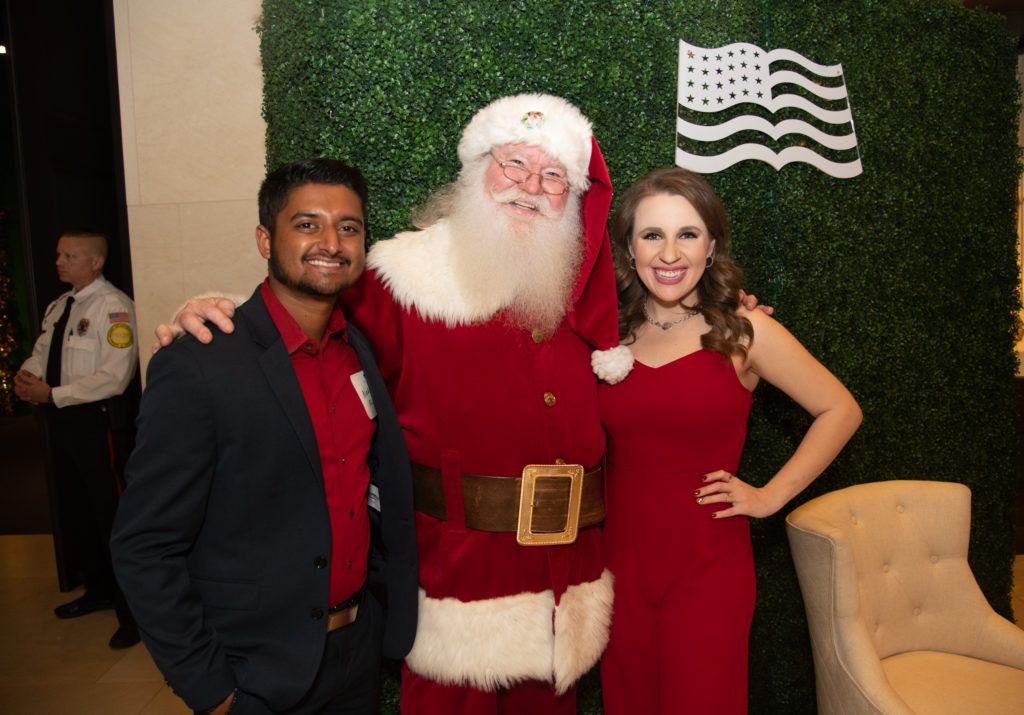 Neel Patel, Santa Claus, Patricia Cannon (Photo by Grant Miller for the George W. Bush Presidential Center)
