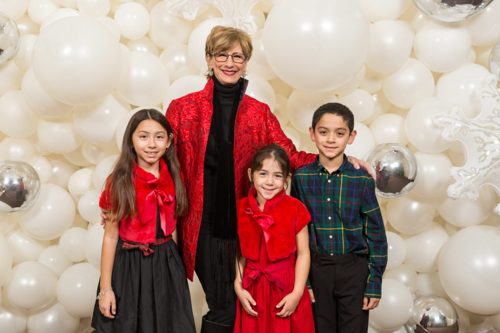 Linda Kuykendall and her grandchildren (Photo by 713 Photography)