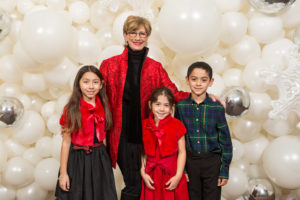 Linda Kuykendall and her grandchildren (Photo by 713 Photography)