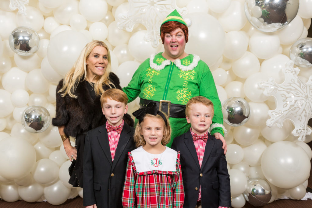 Deneige Dooley with her children and Buddy The Elf (Photo by 713 Photography)