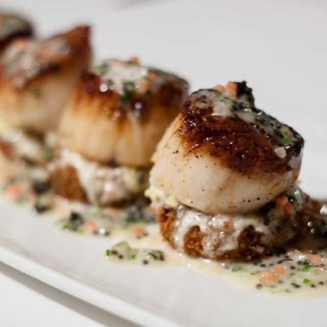 GRACE serves up scallops.