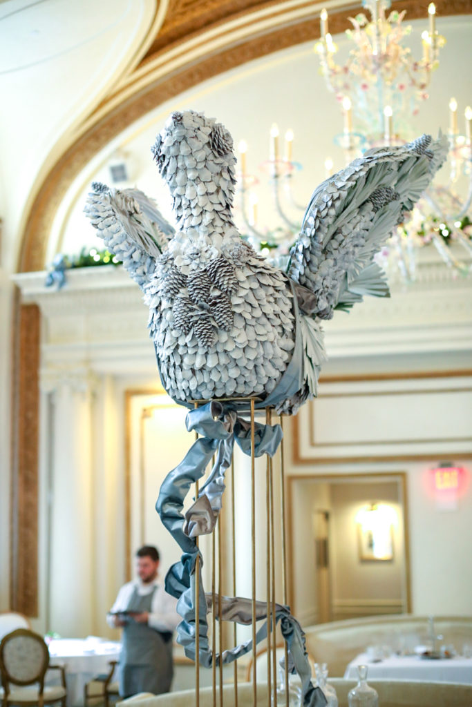 A bird sculpture, call it an oversized ornament, decorates the French Room for the holidays.