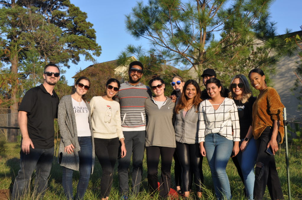 Nothing feels as good to these volunteers as helping keep Houston green.  (Photo by Trees for Houston)