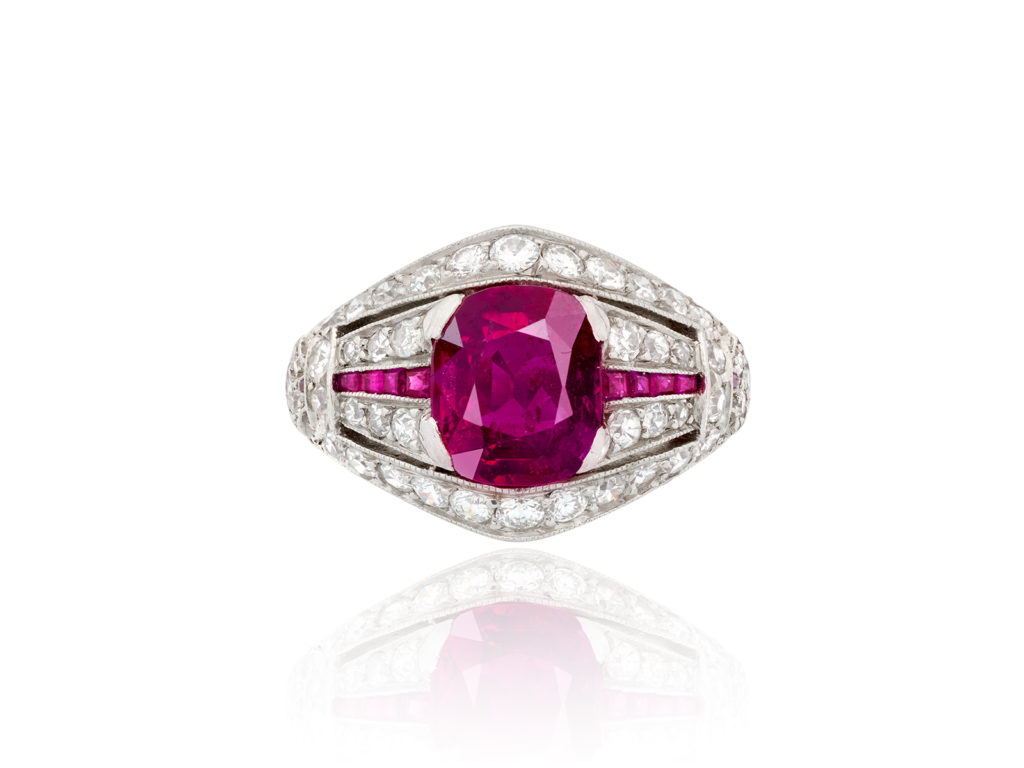 Art Deco natural, no heat cushion-cut Burmese ruby and diamond ring set in platinum, circa 1920.