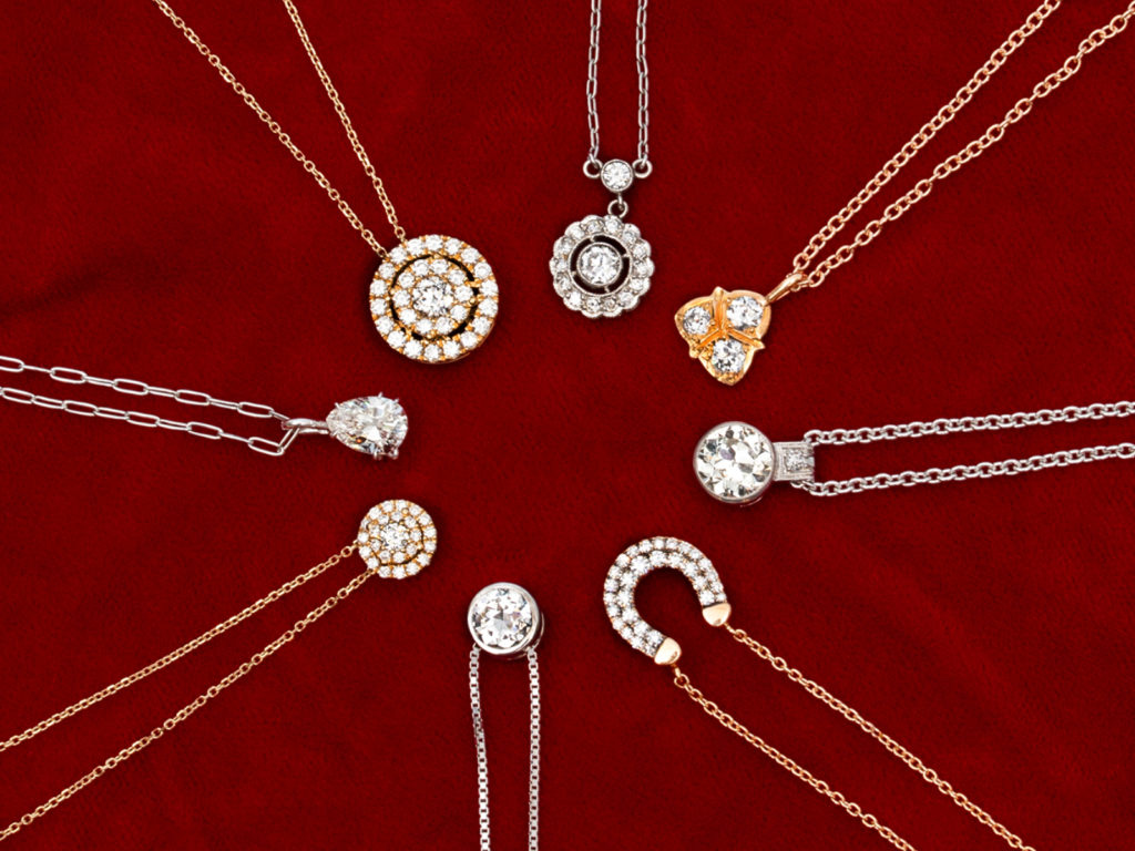 A selection of modern and vintage diamond pendants